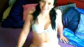 Demonic brunette babe on the webcam showing off crazy