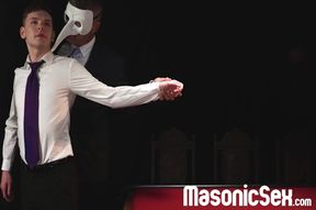 Ethan Tate fulfills his master's lustful desire in the darkroom