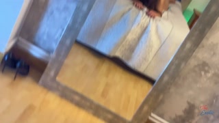 Hot brunette deep throats and rides a big cock in front of the mirror.