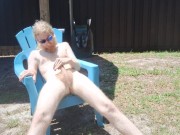 Nudist basks in the sun with his cock and ass out for display