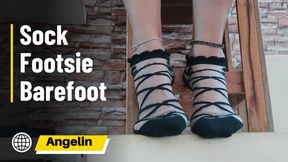 Woman with stockings on her feet moving them until she takes off the stockings (1)
