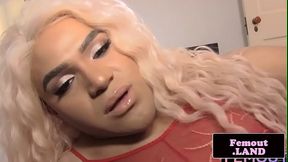 Ebony trap in lingerie tugging her dick