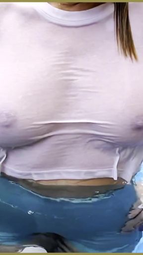 Key moment from &quot;Wifey goes braless in a public exhibitionist dare in a public pool&quot;