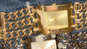 POV cumshot on the face of both a silver and gold Guess heavy metal watch!