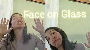 Face on glass