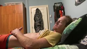 Roommate's panties wrapped around ginger uncut cock as he jerks off and gushes cum all over them.