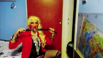 Muscular crossdresser deepthroats dildo and strokes big cock on webcam