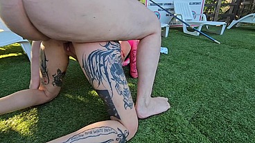 Hot tattooed girl gets fucked in the swimming pool of a naturist campsite.