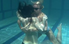 Two sexy sweeties from college playing in the pool