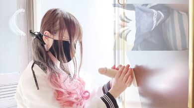 Glasses pigtails girl rams dildo against wall