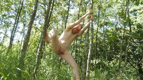 Man outside strips naked showing his small shrivelled little uncut penis and shaved body as he climbs trees in public woods
