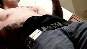 ”Tatted Kyd Cash chainsmoking while working his prick in his boxer shorts”