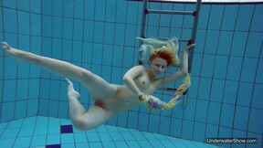 Flirty tight perfect sexy girl swimming gymnastics