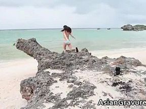 Great real asian cutie on a beach