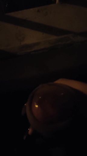 Playing on the window with cars passing by