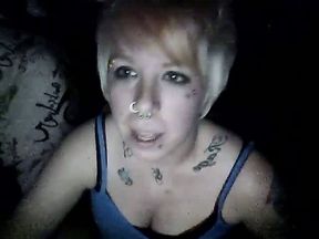 Short haired blonde skank in the dark room on webcam