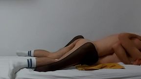 beautiful young couple makes love in the college dorm room