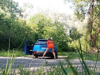 I clean the windows of my car on the side of the road in a minidress with an butt-ramming