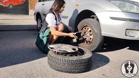 Dirndl Slut Gets Dirty and Oily Changing Tires