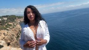 Brenda Biceps Flexing Nude on a Cliff