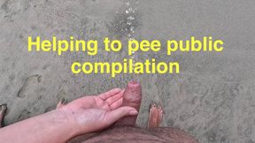 Girl helps hold stranger's dick while peeing at public beach