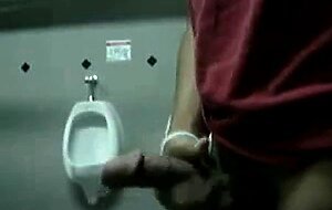 Public Handjob in a Restroom by Bigcockflasher