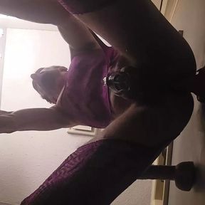 Caged sissy riding dildo leaking