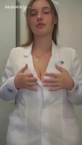 titty drop, a young, gorgeous ukrainian woman, video created by AI
