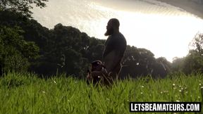 Naughty gal masturbates while watching a couples outdoor sex