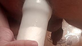 my sagging anal lips rub against a bottle in a very sexy way. real male cunt!