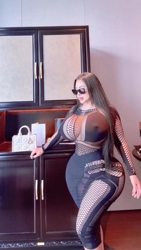 Bimbo Asian fake tits and ass on display