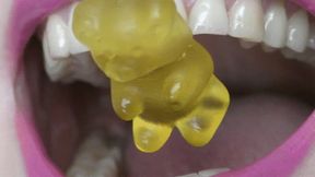 Let gummy bears feel the sharp efges of your wonderful sharp pointiy teeth MP4 FULL HD 1080p