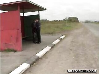 Secluded bus stop reveals a blow job that becomes getting plowed from behind for this clothed girl