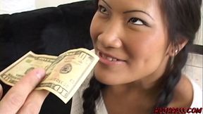 Petite Asian sucks massive dick and rides it for money