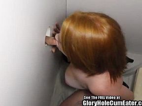 Redhead Cherry fucks strange men in the gloryhole