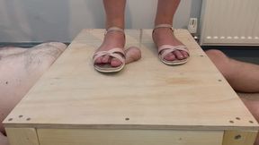Cock battered under dirty summer sandals.