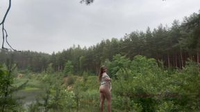 Teen Shows Tits and Asshole During a Storm in the Forest