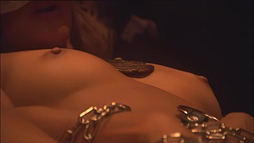 This masked brunette is chained to the bed and awaiting orders