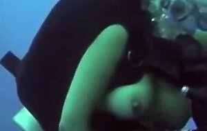 Fucking this busty cutie underwater while scuba diving