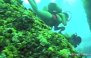 Fucking this busty cutie underwater while scuba diving