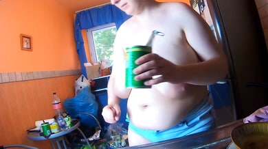 Lena Rose the curvy brunette MILF shows off her full figure while washing dishes topless