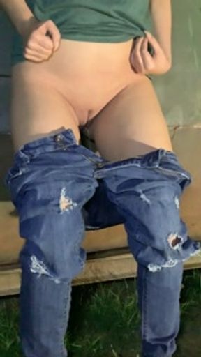 Girl soaks jeans while desperately trying to pee behind dumpster