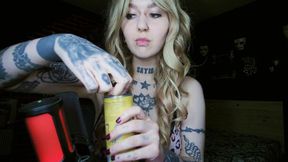 Alternative blonde drinking and burping