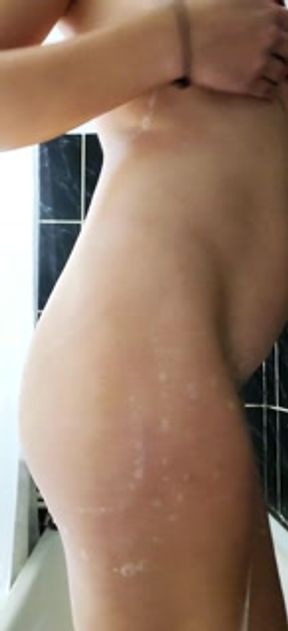 Look what my little step sister is doing in the shower.. she has a Virgin hairy pussy