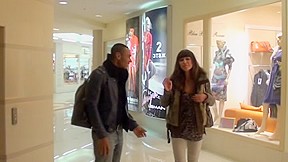 Brown gal sucks jocks in the mall