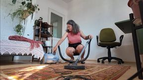 maid cleaning dirty carpet in tight pencil skirt and silk blouse m0