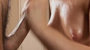 Busty Bibi enjoys a handjob with lots of cream