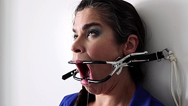 Extreme gag predicament - nailed to the wall
