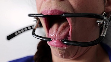 Extreme gag predicament - nailed to the wall