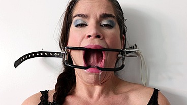 Extreme gag predicament - nailed to the wall